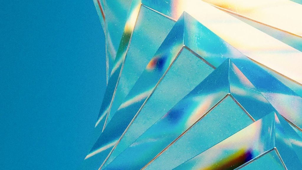A prism refracting light — the right shape for each team